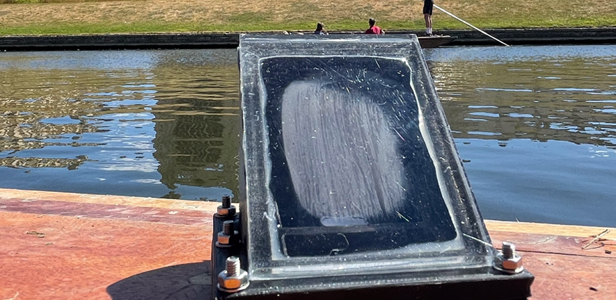 The solar powered artificial leaf on a punt on the River Cam