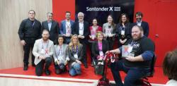 Group of winners posing with their trophies