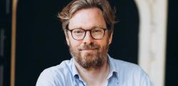 Erwin Reisner smiling at camera