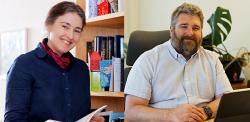 Professor Dame Clare Grey and Professor Oren Scherman smiling at camera