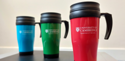 Three travel mugs