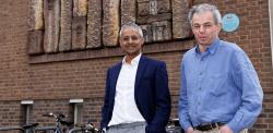 Shankar and David stand in front of the department of chemistry.