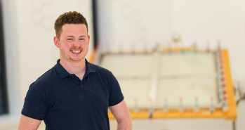 Shaun Impey in front of the solar reactor.