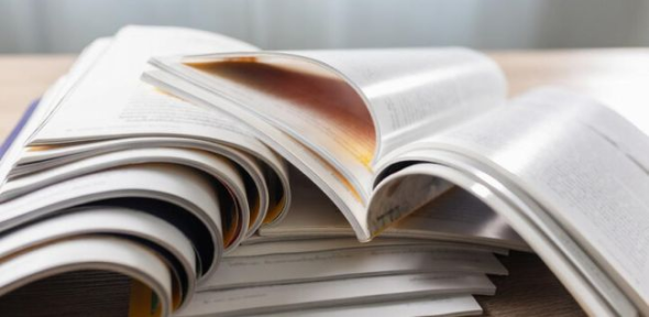 This image shows some magazines on a table