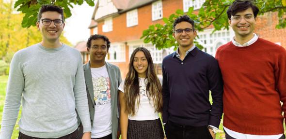 The five student winners standing in a group facing camera