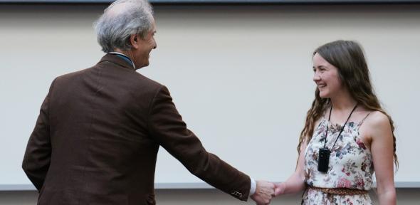 Chloe shaking hands with Vice Chancellor Freeling
