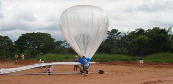 A large balloon holding an instrument about to be launched