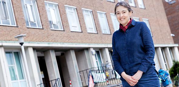 Clare Grey in front of the Yusuf Hamied department of chemistry.