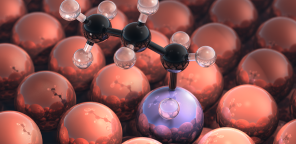 Inert metal particles (red) with a single reactive metal particle (purple) catalyst reacting with a propane molecule (black).