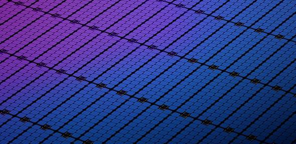 Close up of a solar panel with a purple to blue gradient.