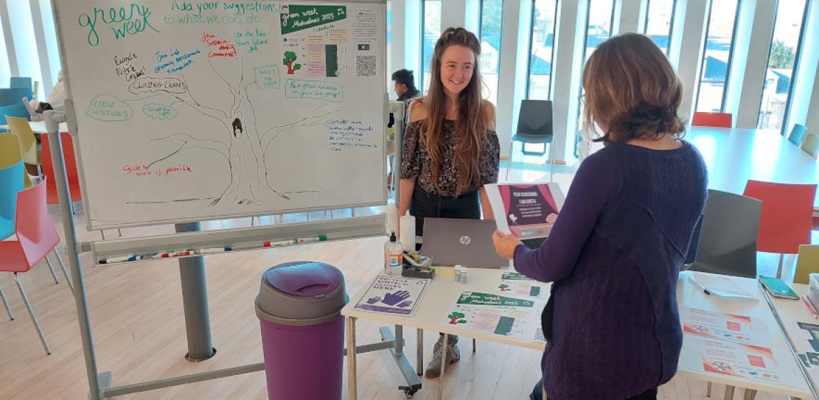 Chloe Balhatchet at Suggestion Board and table in Cybercafé during Green Week