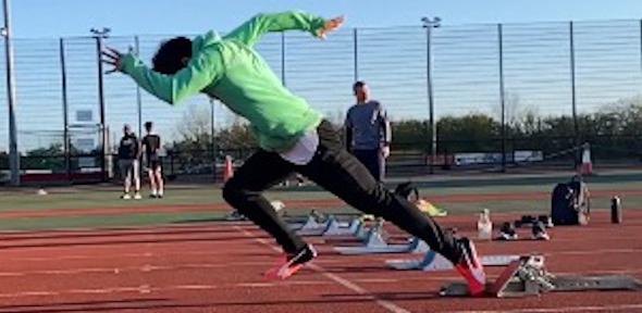 Chung Tu getting a fast start off the starting blocks on a track