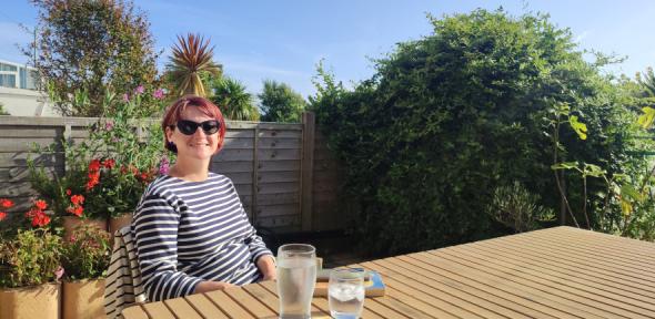 Alex relaxing on a sunny day in the garden