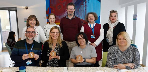 Posed group shot of Bake-Off entries