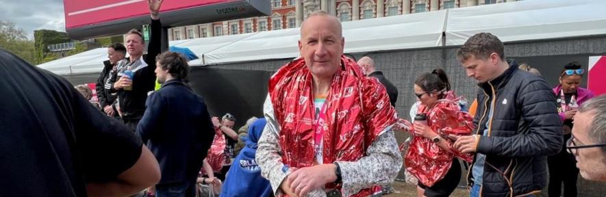 James Keeler standing at Marathon Finish line