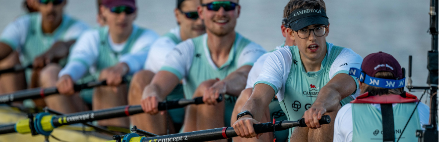 The Cambridge University Boat Club with Matthew Edge front right in a black cap.